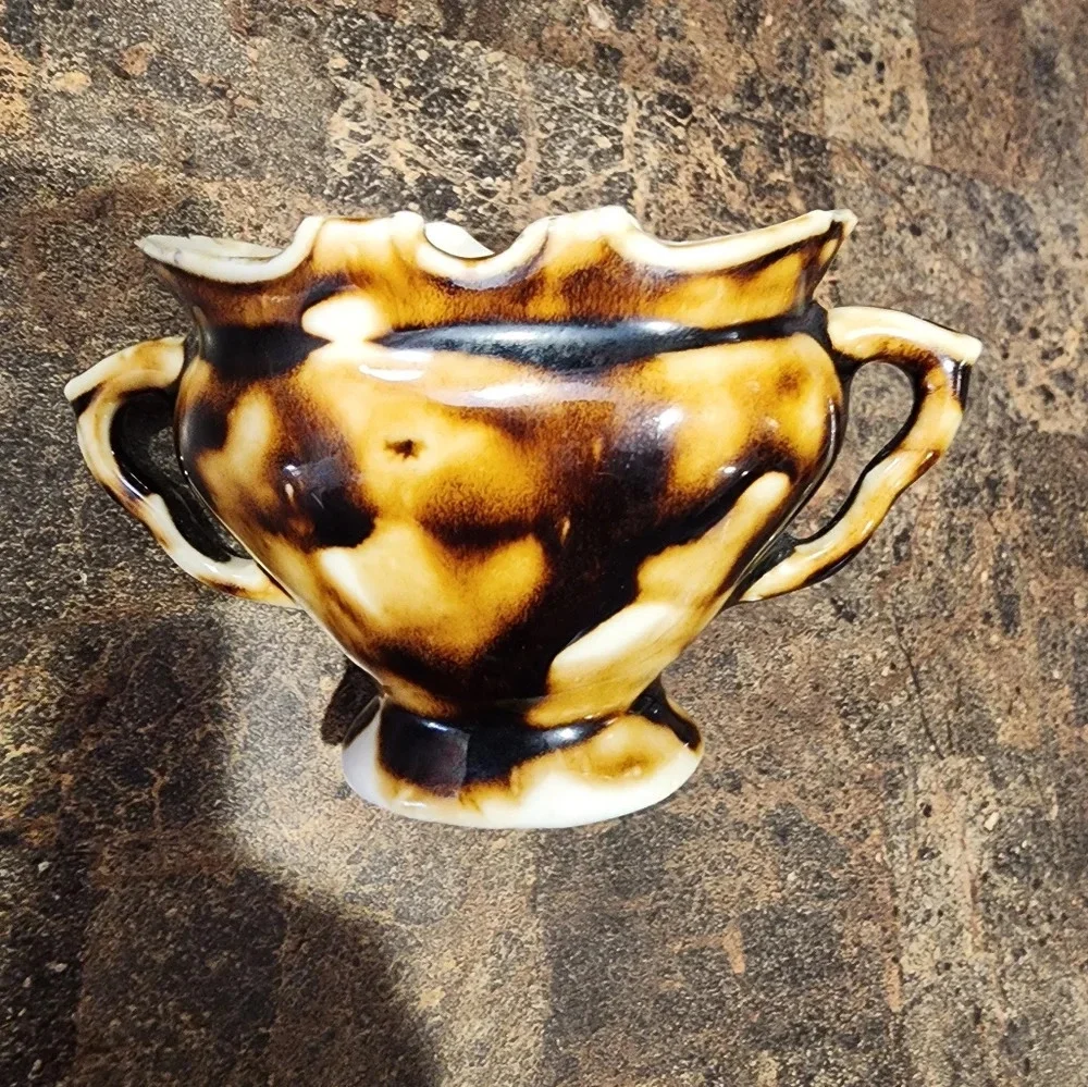 Vintage miniature two handled vase with raised rose, small porcelain vase